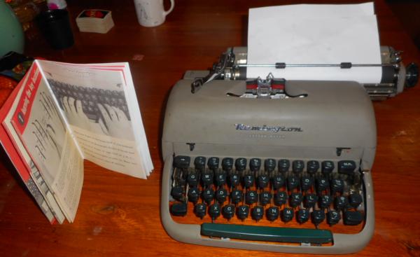 photo of the typewriter and manual.